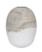 White and beige glass vase on a white background.