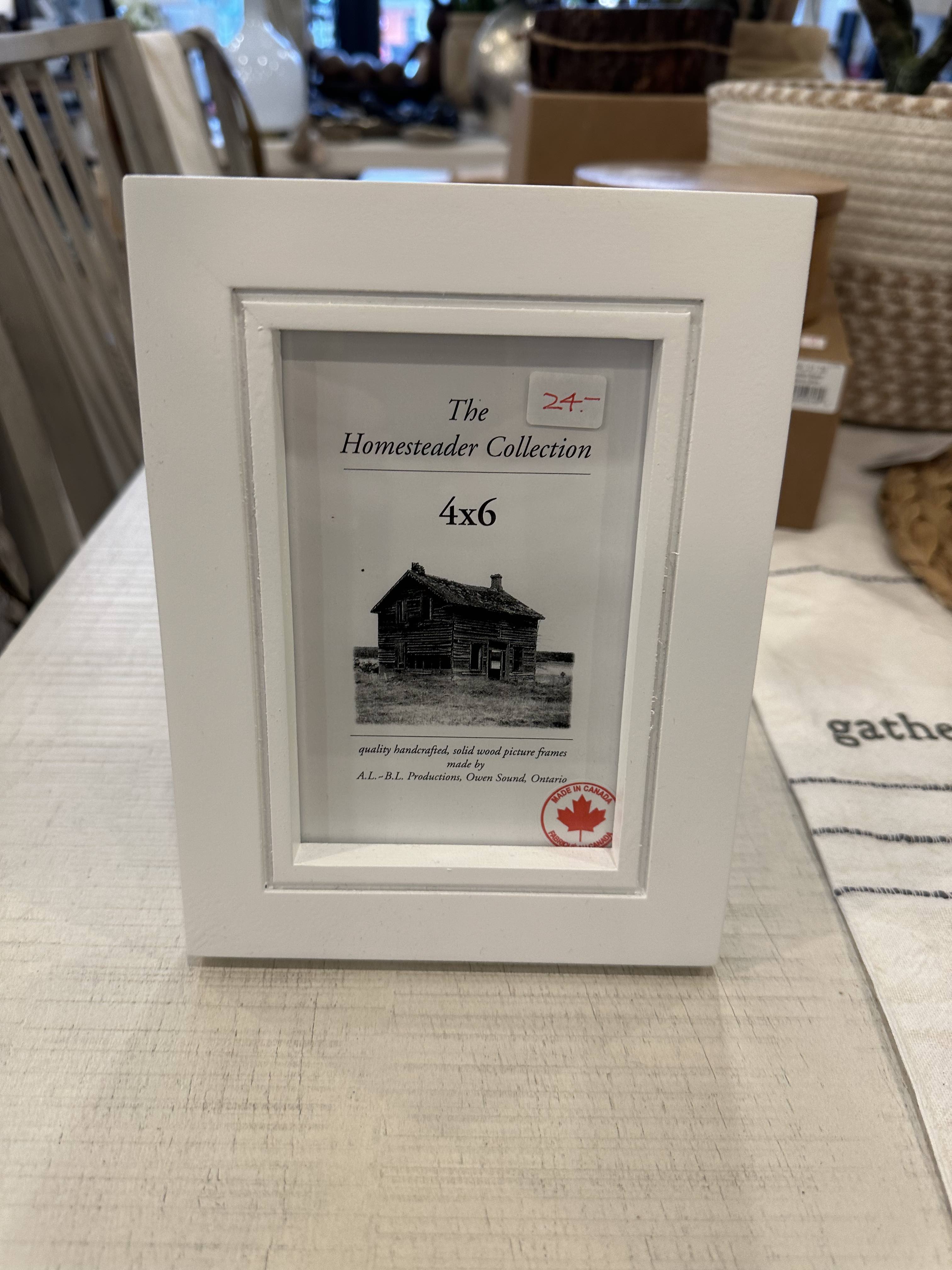A white 4x6 picture frame with a clear glass front, labelled 'The Homestead Collection - 4x6'.