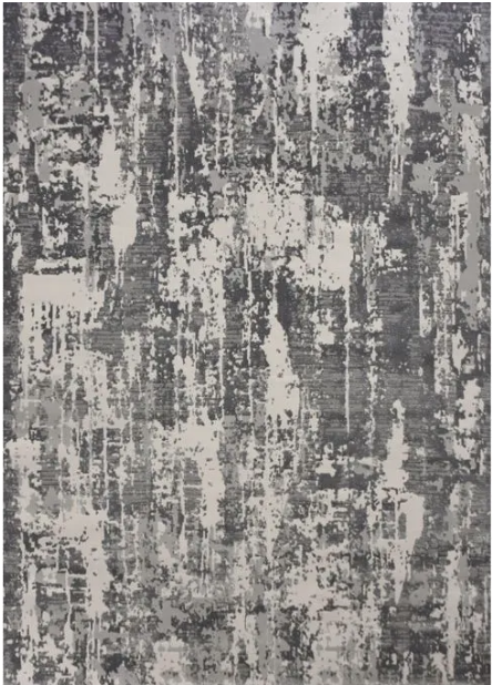 A rectangular area rug with a contemporary geometric pattern in gray tones, made from polyester and polypropylene.