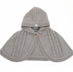 Gray knitted poncho with hood on a white background