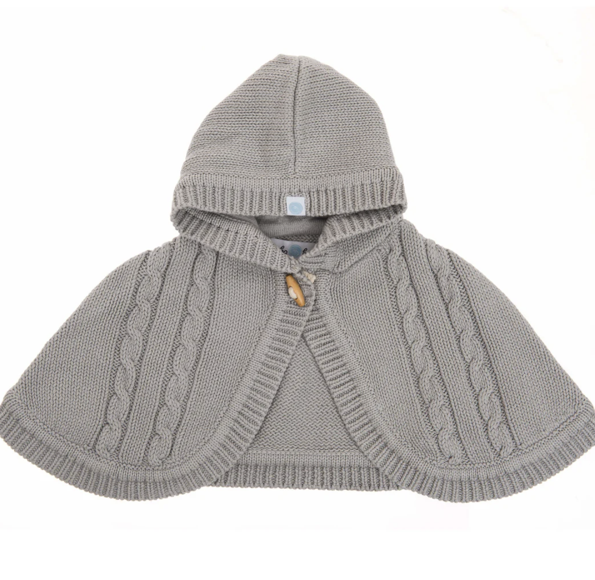Gray knitted poncho with hood on a white background