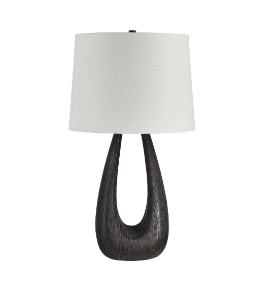 A Beckham table lamp with a dark walnut-painted iron body and an ivory linen tapered drum shade.