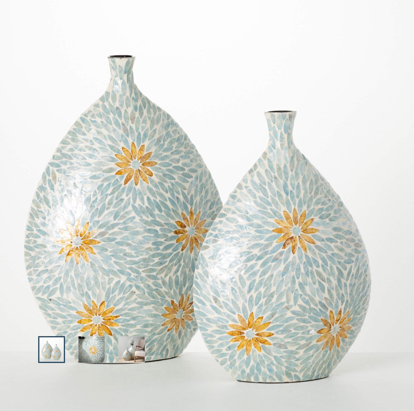 Two large teardrop shaped vases with orange and blue floral pattern. 
