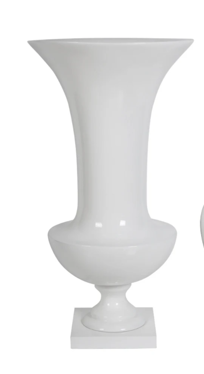 A bright white, classic flared urn with a stand.