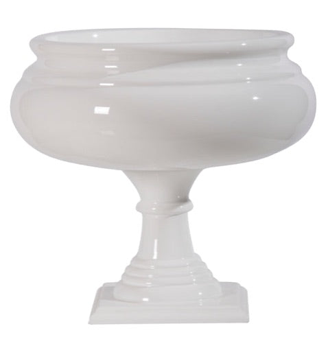 A glossy white classic Roman urn on a pedestal.