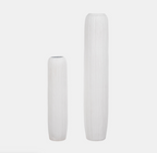 Two white textured vases on a light gray background