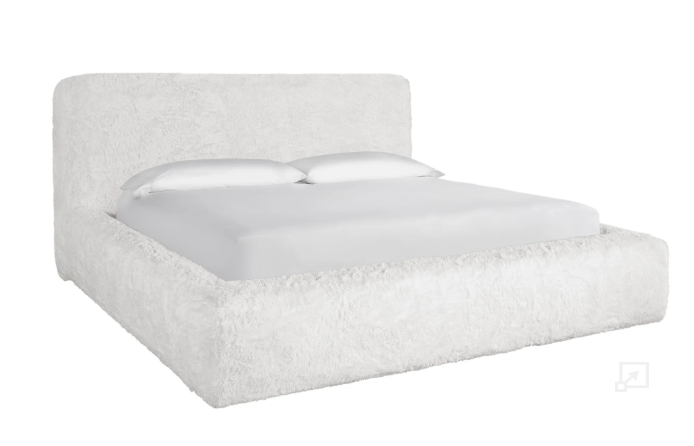 A white, upholstered Highland queen-sized bed with a plush headboard and a mattress.