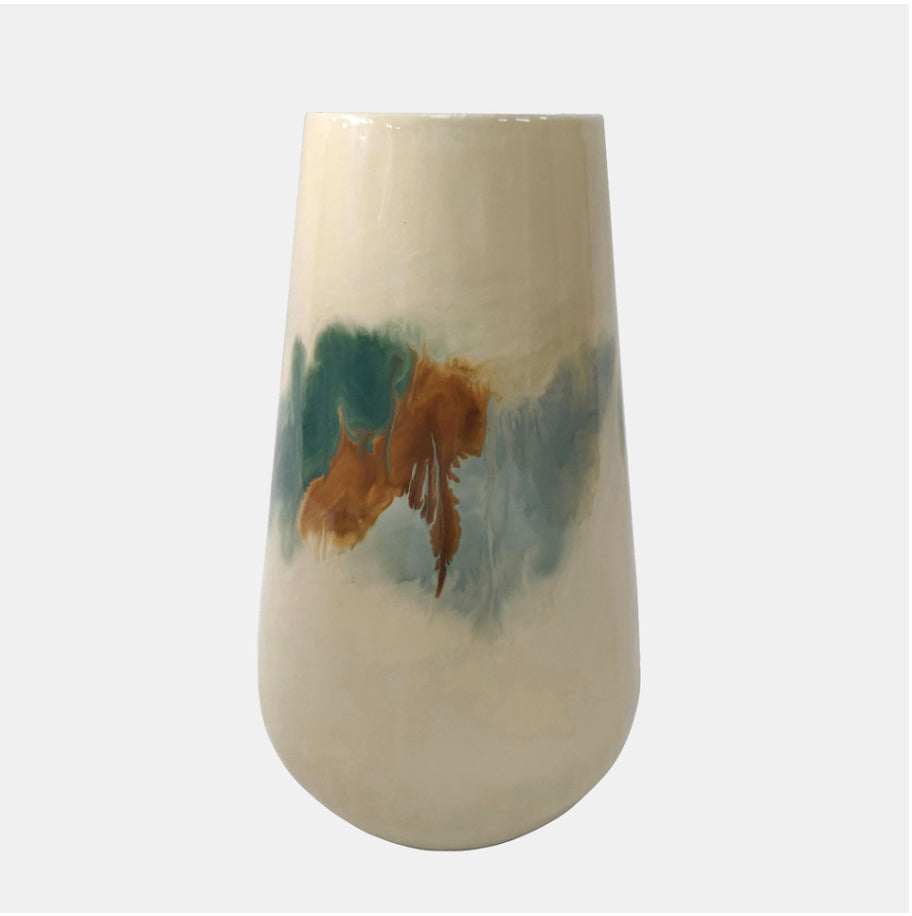 White beige vase with green, blue and brown decorative stain in the middle. 
