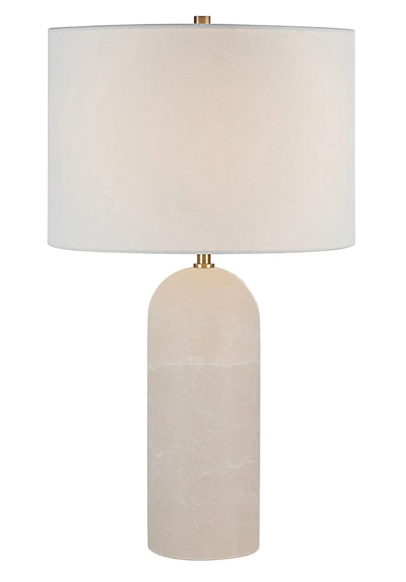 A table lamp with a tall, cylindrical Onyx stone base and an ivory linen drum shade, with a dimmer switch and a LED bulb.