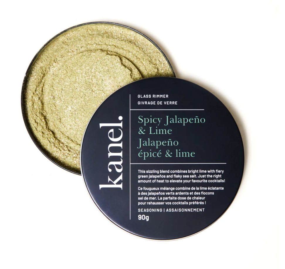 Circular container of Kanel Spicy Jalapeno & Lime Cocktail Rimmer seasoning on a white background. 
