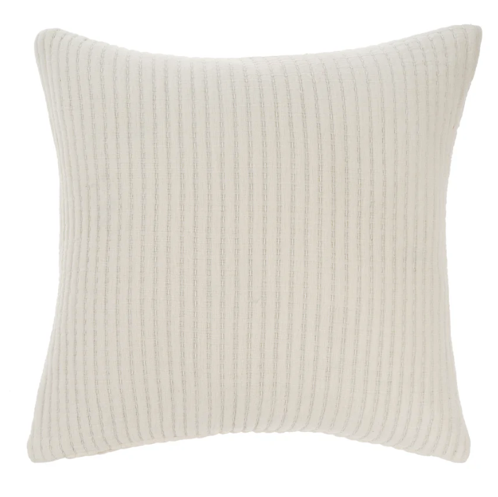 A white square-shaped cushion with a textured pattern