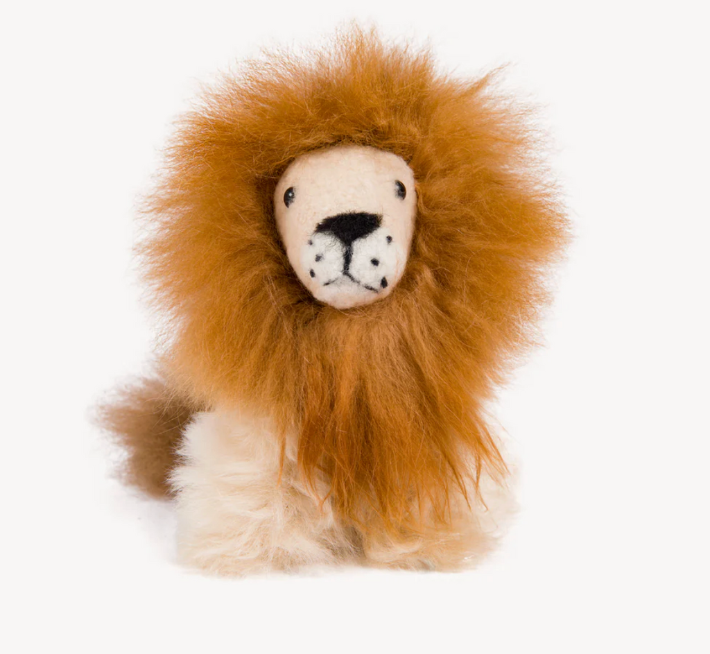 Stuffed lion toy with a fluffy mane on a white background