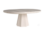 Round dining table with a light wood finish on a white background