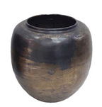 Black ceramic pot with gold bronze detail on a white background.