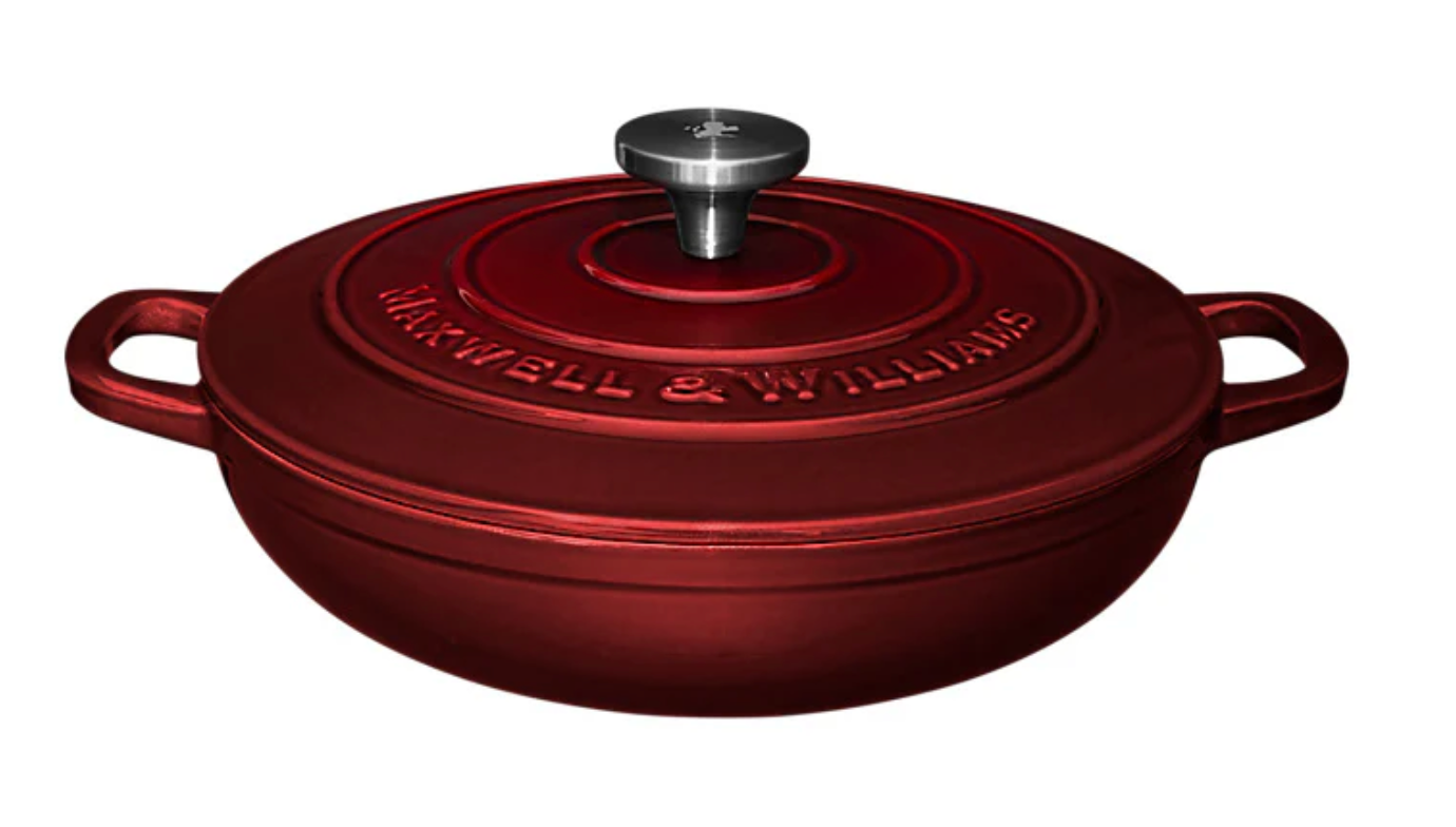 Red cast iron cookware with 'Maxwell & Williams' branding on a white background