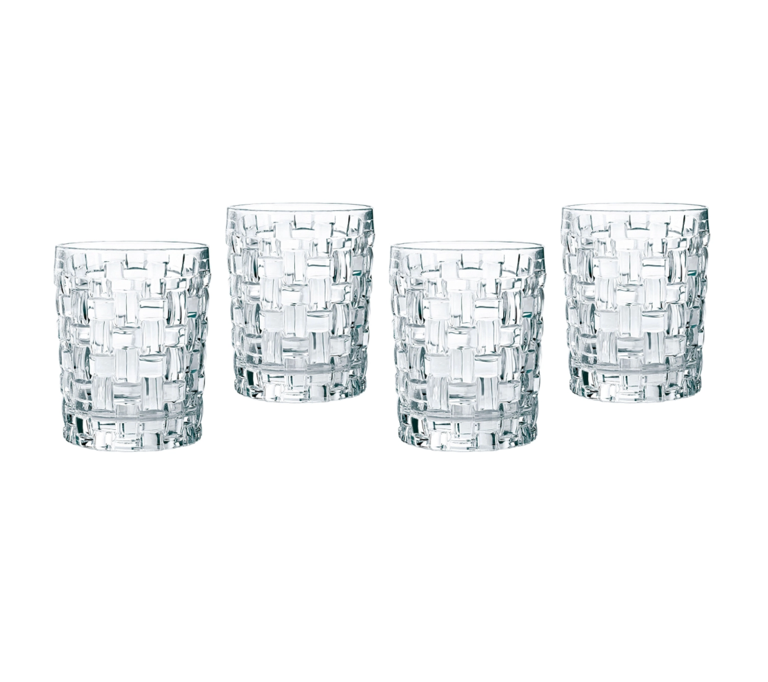 Four glass whiskey tumblers with a basket weave pattern. 