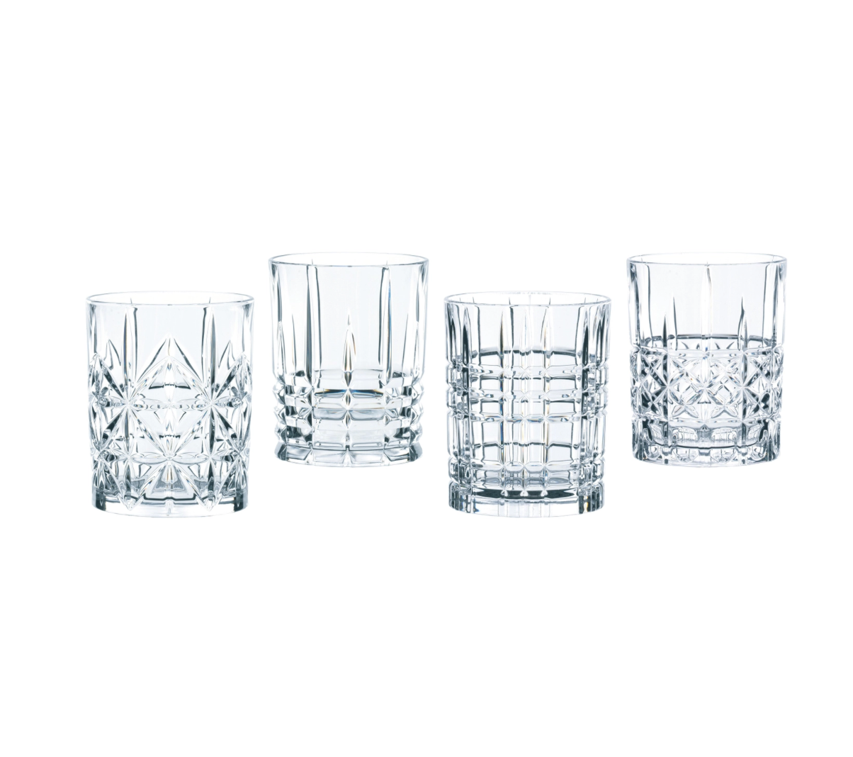 Set of 4 glas whisky tumblers with geometric patterns etched in. 
