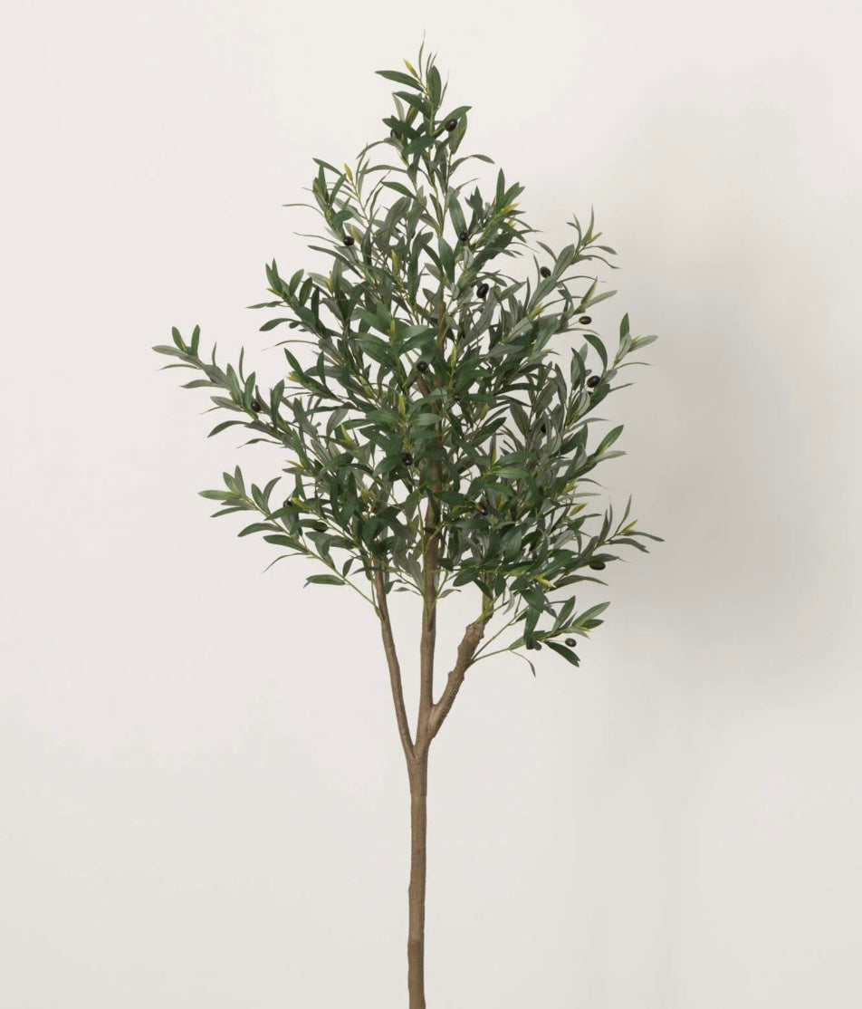 Artificial olive tree with green leaves in a potted container against a white background
