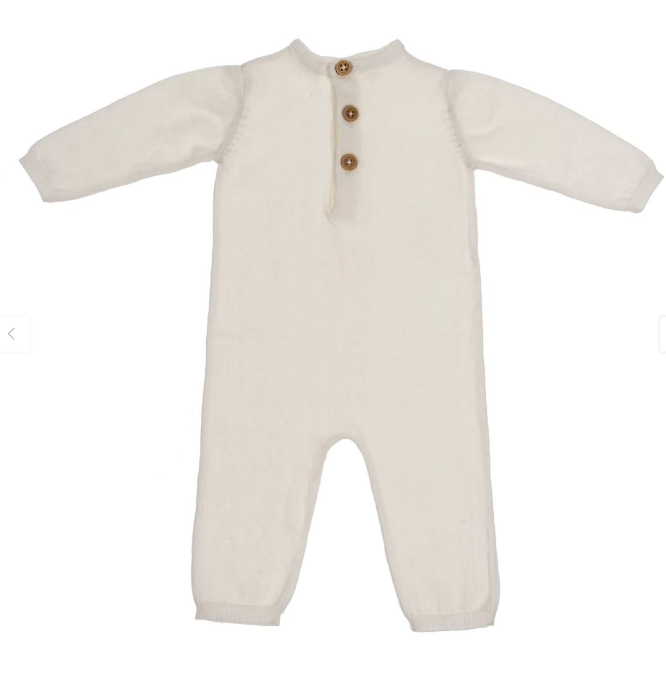A white cotton jumpsuit for a baby size 6-12 months with long sleeves and wooden buttons.