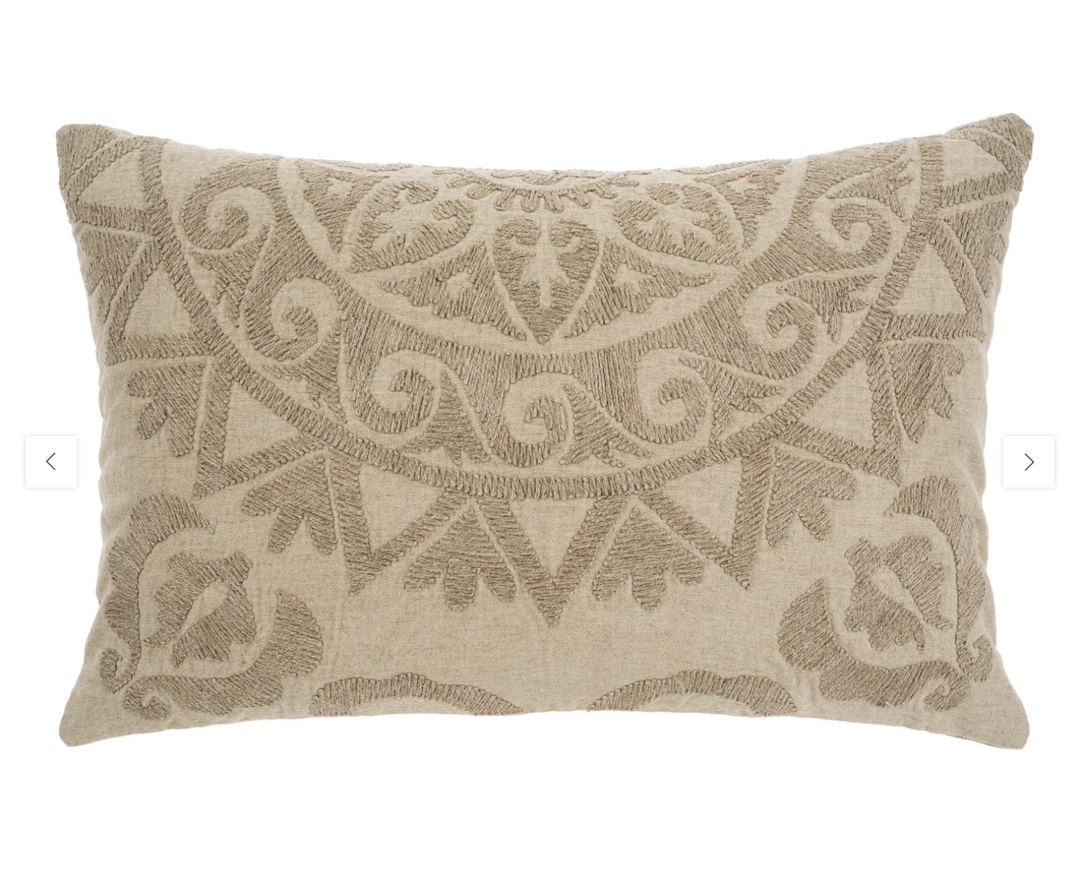 A rectangular Suzani boucle pillow in beige color with a geometric pattern.