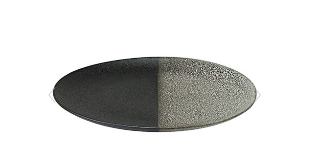 Two-tone grey and black round platter on a white background. 