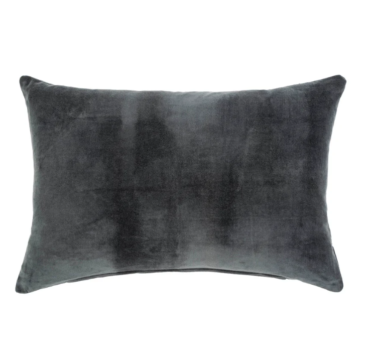 A rectangular-shaped cushion with a charcoal gray velvet surface with a plush feather down filler.