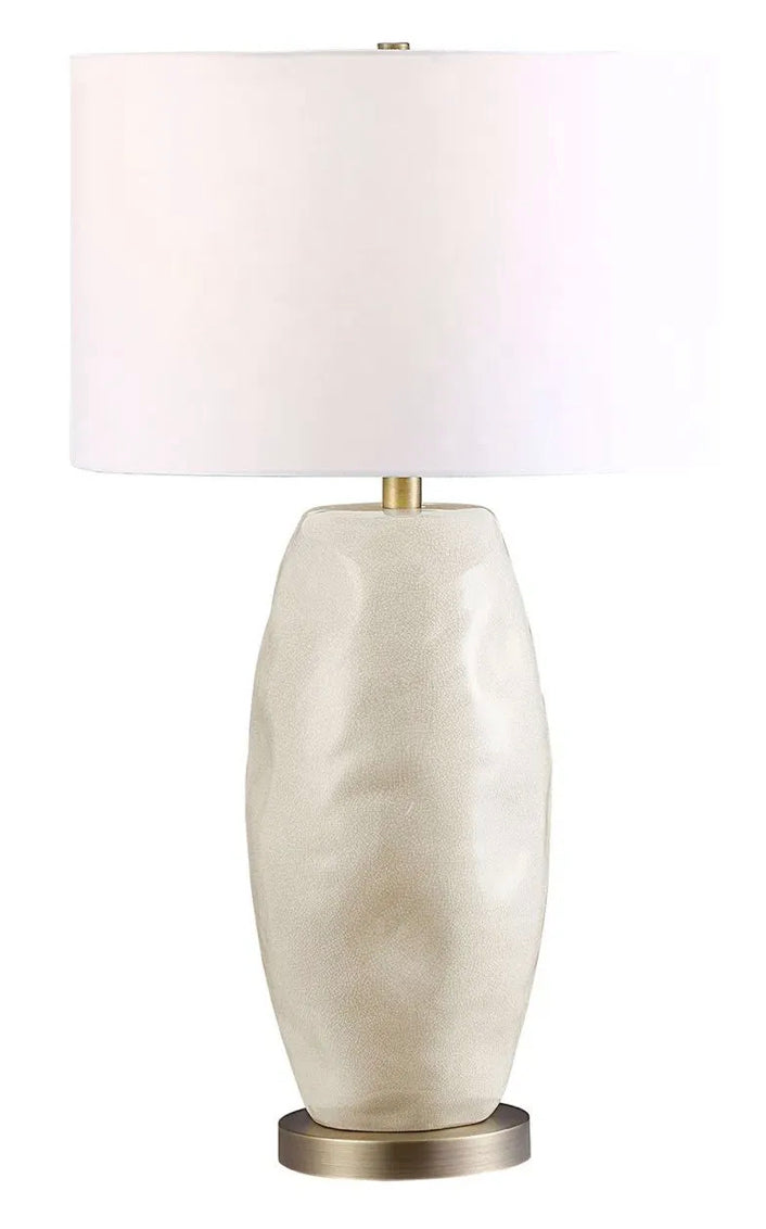 Cream crackle textured ceramic table lamp with an off-white cotton drum shade. 